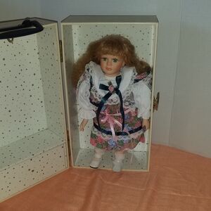 Porcelain Doll with Floral Dress and Display Case
